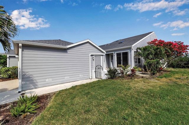 1322 Perico Point Cir, Bradenton, FL 34209 - ranch-style house with a front yard and a shingled roof
