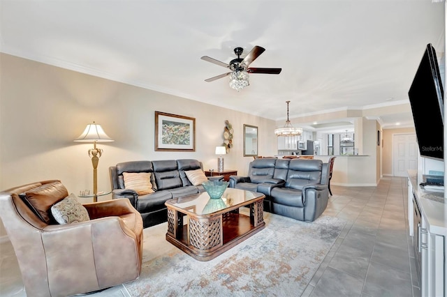 living area with ceiling fan, ornamental molding, a chandelier, and baseboards