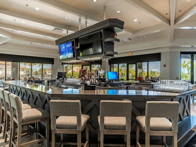 bar with recessed lighting and beam ceiling