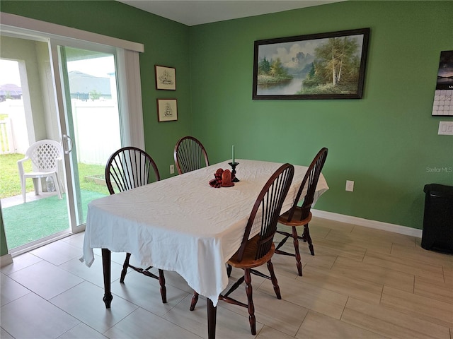 13156 Merlot Sunstone Cv, Parrish, FL 34219 - dining area with baseboards