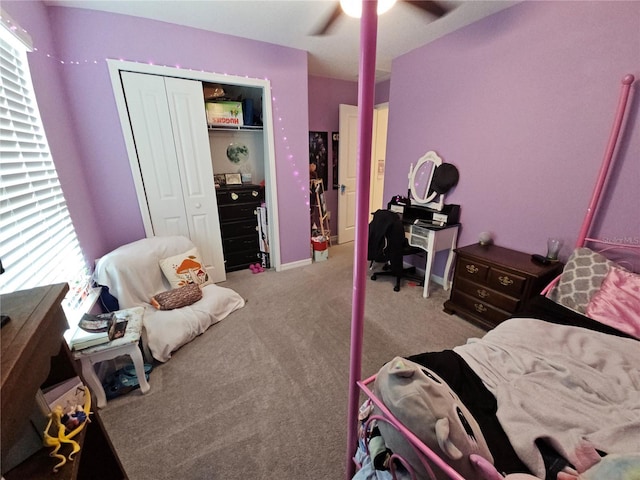 13156 Merlot Sunstone Cv, Parrish, FL 34219 - carpeted bedroom featuring a closet and a ceiling fan