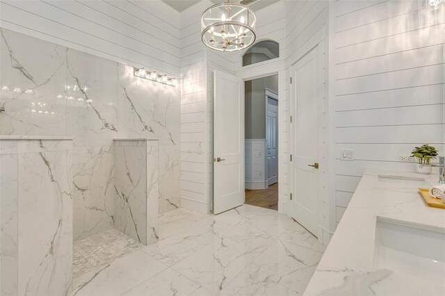 52 Grande Fairway, Englewood, FL 34223 - full bathroom featuring a chandelier, marble finish floors, a marble finish shower, and double vanity