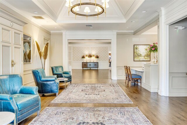 52 Grande Fairway, Englewood, FL 34223 - community lobby featuring a decorative wall, crown molding, and wainscoting