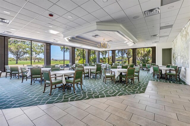 52 Grande Fairway, Englewood, FL 34223 - community lobby featuring a drop ceiling and expansive windows
