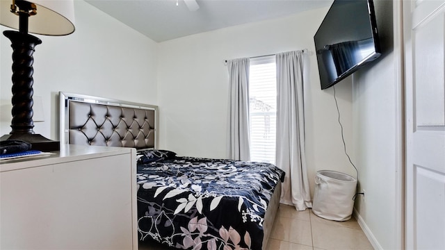 2330 28th Ave E, Palmetto, FL 34221 - bedroom with light tile patterned flooring, baseboards, and a ceiling fan
