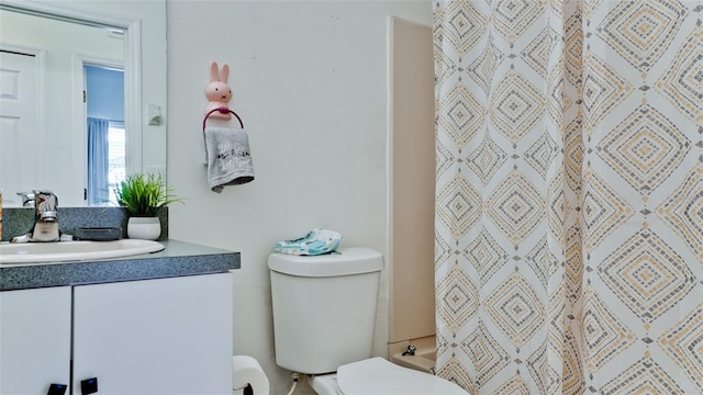 2330 28th Ave E, Palmetto, FL 34221 - bathroom with toilet, vanity, and a shower with curtain