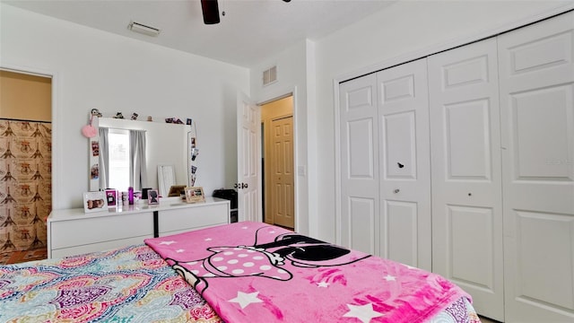 2330 28th Ave E, Palmetto, FL 34221 - bedroom featuring a closet and a ceiling fan