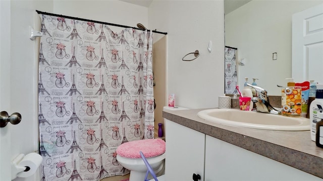 2330 28th Ave E, Palmetto, FL 34221 - bathroom with vanity, a shower with shower curtain, and toilet