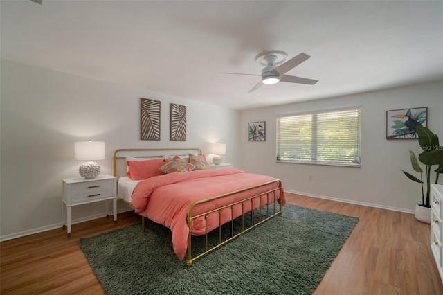 7202 18th Ave NW, Bradenton, FL 34209 - bedroom featuring light wood-type flooring, baseboards, and a ceiling fan