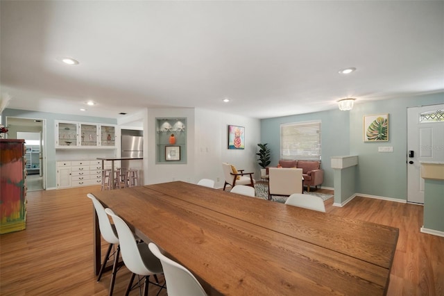 7202 18th Ave NW, Bradenton, FL 34209 - dining space featuring wood finished floors, recessed lighting, and baseboards
