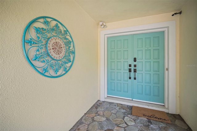 7202 18th Ave NW, Bradenton, FL 34209 - doorway to property featuring stucco siding