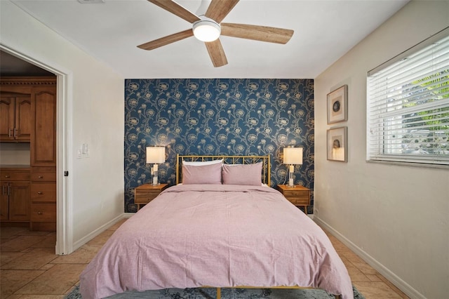 7202 18th Ave NW, Bradenton, FL 34209 - bedroom with baseboards, wallpapered walls, and ceiling fan