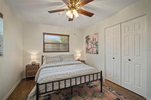 7202 18th Ave NW, Bradenton, FL 34209 - bedroom with wood finished floors, a closet, baseboards, and a ceiling fan