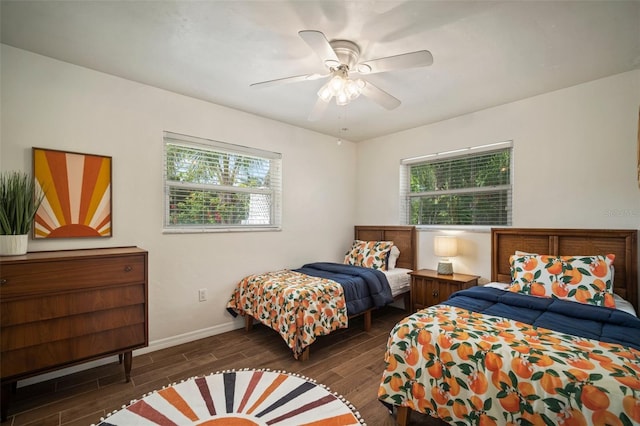 7202 18th Ave NW, Bradenton, FL 34209 - bedroom featuring wood finished floors, multiple windows, baseboards, and a ceiling fan