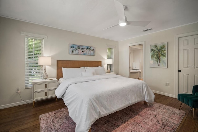7202 18th Ave NW, Bradenton, FL 34209 - bedroom with dark wood-style flooring, baseboards, ceiling fan, ensuite bath, and crown molding