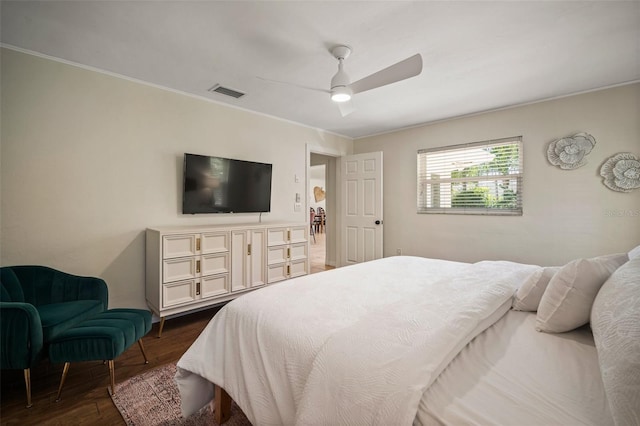 7202 18th Ave NW, Bradenton, FL 34209 - bedroom featuring dark wood-style flooring, ceiling fan, and ornamental molding