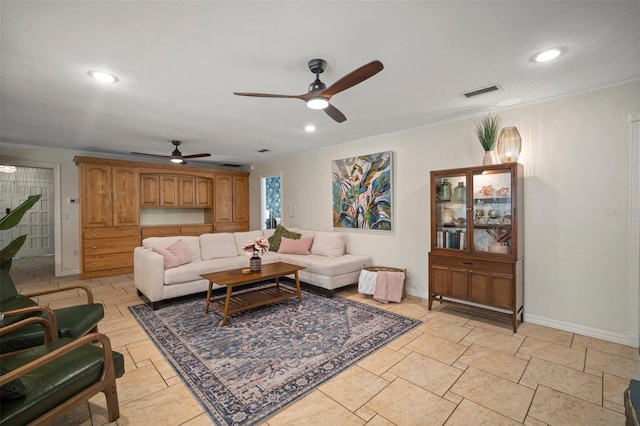 7202 18th Ave NW, Bradenton, FL 34209 - living room featuring ceiling fan, recessed lighting, baseboards, and stone tile floors