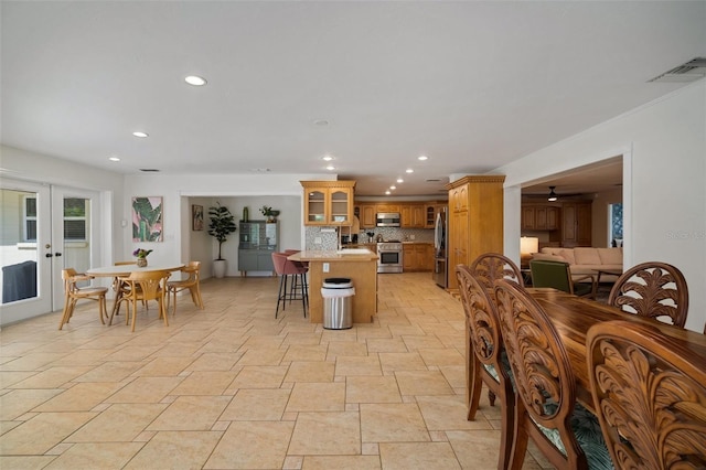 7202 18th Ave NW, Bradenton, FL 34209 - dining area featuring recessed lighting and light stone finish flooring