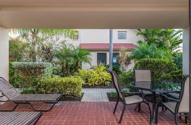 4621 Gulf Of Mexico Dr Unit 2F, Longboat Key, FL 34228 - view of patio / terrace featuring outdoor dining space