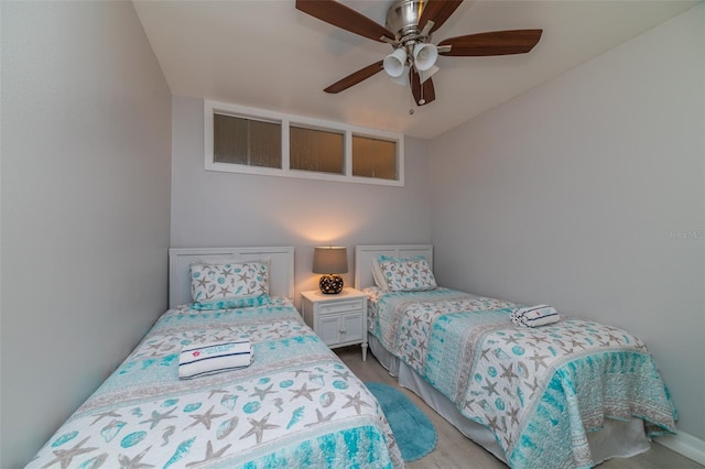 4621 Gulf Of Mexico Dr Unit 2F, Longboat Key, FL 34228 - bedroom featuring wood finished floors and a ceiling fan