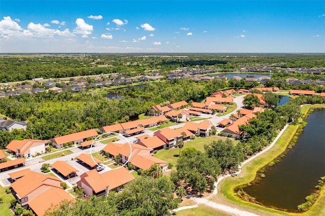 6462 Draw Ln Unit 72, Sarasota, FL 34238 - aerial perspective of suburban area featuring a large body of water and a tree filled landscape