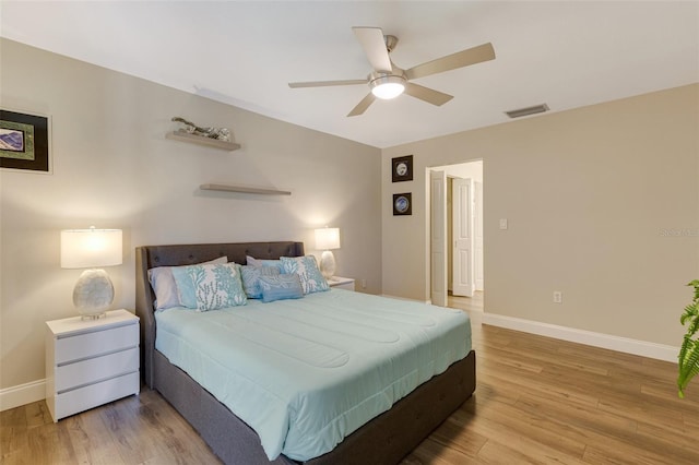 6462 Draw Ln Unit 72, Sarasota, FL 34238 - bedroom featuring baseboards, light wood finished floors, and ceiling fan