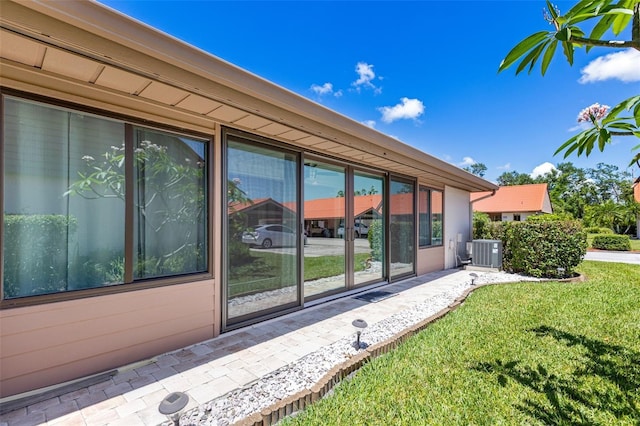 6462 Draw Ln Unit 72, Sarasota, FL 34238 - view of side of property with central AC and a yard