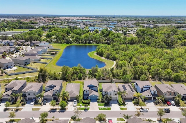 5033 Brickwood Rise Dr, Wimauma, FL 33598 - aerial perspective of suburban area with a large body of water