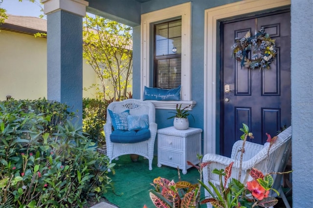 5033 Brickwood Rise Dr, Wimauma, FL 33598 - entrance to property featuring a porch and stucco siding