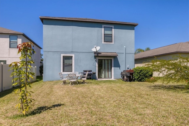 5033 Brickwood Rise Dr, Wimauma, FL 33598 - back of property with stucco siding