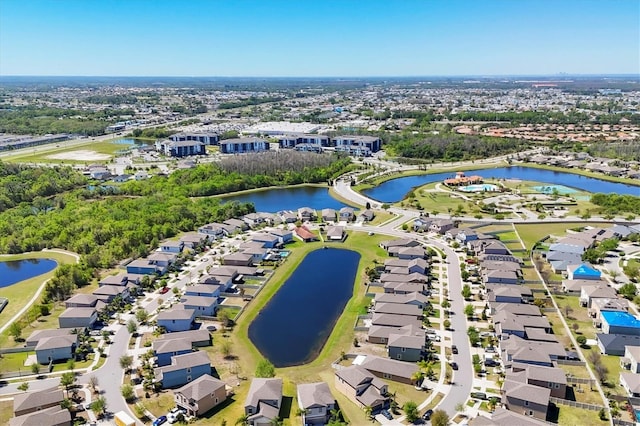 5033 Brickwood Rise Dr, Wimauma, FL 33598 - aerial perspective of suburban area featuring a large body of water