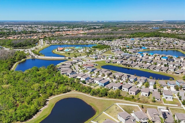 5033 Brickwood Rise Dr, Wimauma, FL 33598 - aerial view of property and surrounding area featuring nearby suburban area and a nearby body of water