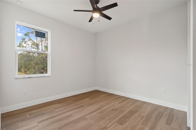 2704 Gaspar Ave, North Port, FL 34288 - empty room with light wood-type flooring, a ceiling fan, and baseboards