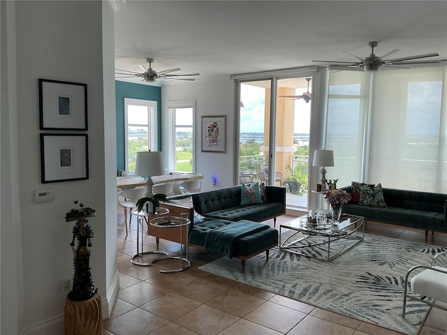 130 Riviera Dunes Way Unit 304, Palmetto, FL 34221 - living area featuring a ceiling fan and tile patterned flooring