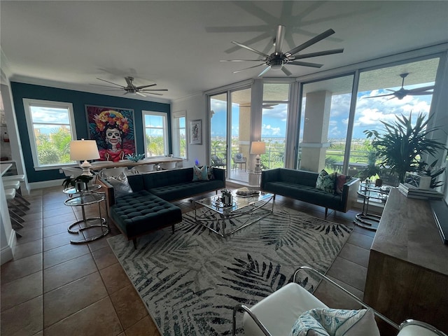 130 Riviera Dunes Way Unit 304, Palmetto, FL 34221 - living area with a ceiling fan, tile patterned floors, and a wall of windows