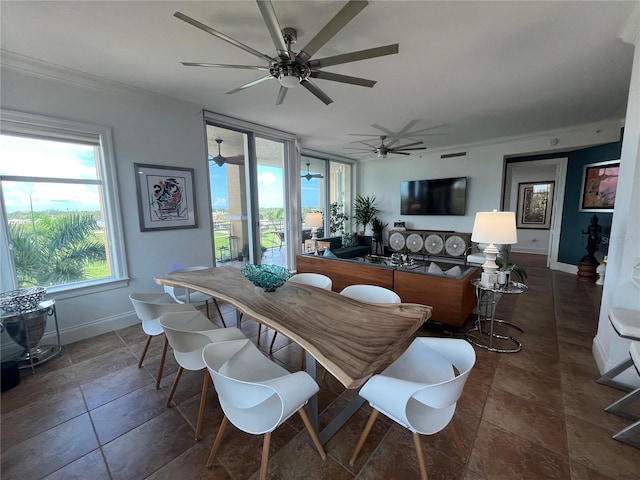 130 Riviera Dunes Way Unit 304, Palmetto, FL 34221 - dining area featuring ceiling fan and baseboards