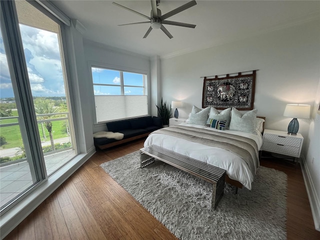 130 Riviera Dunes Way Unit 304, Palmetto, FL 34221 - bedroom with wood finished floors, ornamental molding, and ceiling fan