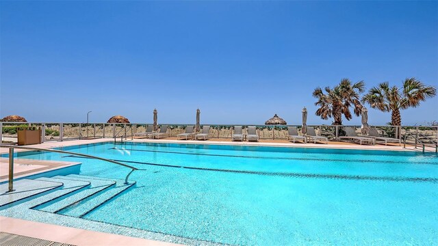 2425 Gulf Of Mexico Dr Unit 6A, Longboat Key, FL 34228 - community pool featuring fence and a patio