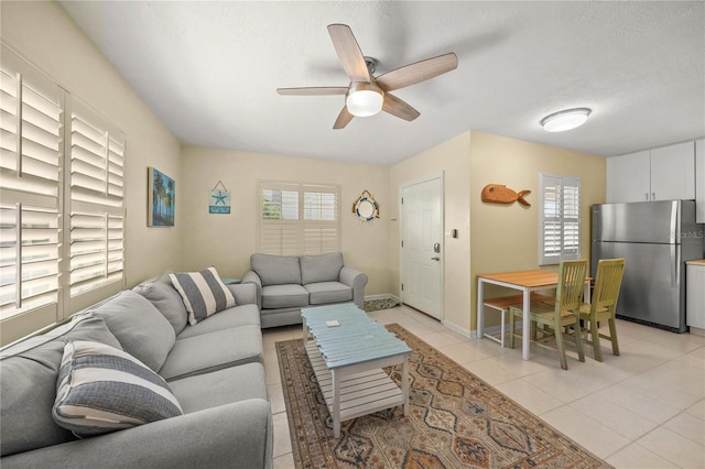 2037AND2039 Jo An Dr, Sarasota, FL 34231 - living area featuring ceiling fan and light tile patterned flooring