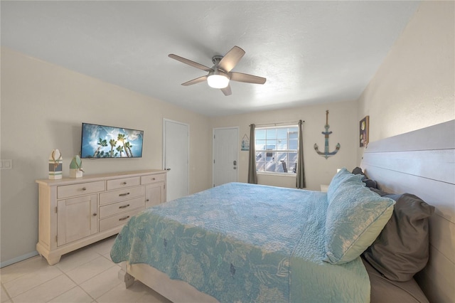 2037AND2039 Jo An Dr, Sarasota, FL 34231 - bedroom featuring light tile patterned floors and a ceiling fan