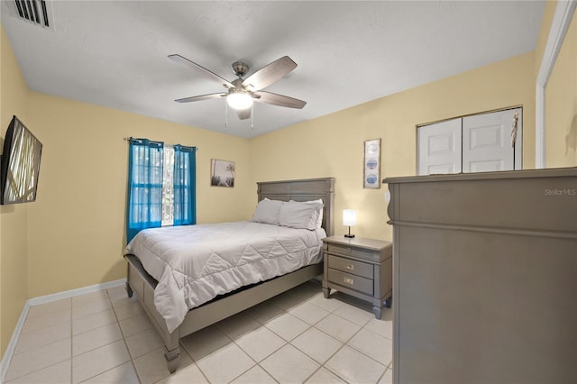 2037AND2039 Jo An Dr, Sarasota, FL 34231 - bedroom with light tile patterned floors and a ceiling fan