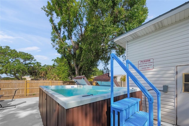 2037AND2039 Jo An Dr, Sarasota, FL 34231 - wooden terrace with a hot tub