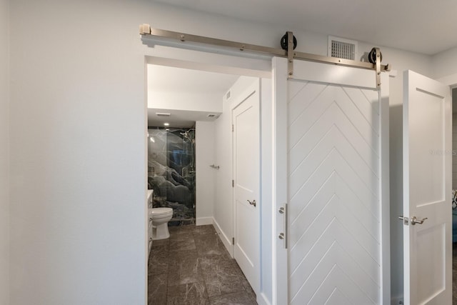 corridor with a barn door