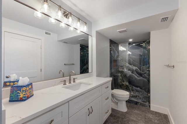 bathroom with toilet, a marble finish shower, baseboards, and vanity