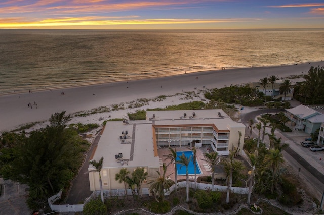 view of property location featuring expansive coastline and a pool