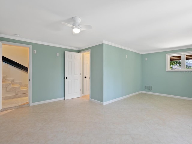 7320 Melaleuca Way, Siesta Key, FL 34242 - spare room with a ceiling fan, stairway, baseboards, ornamental molding, and a smoke detector