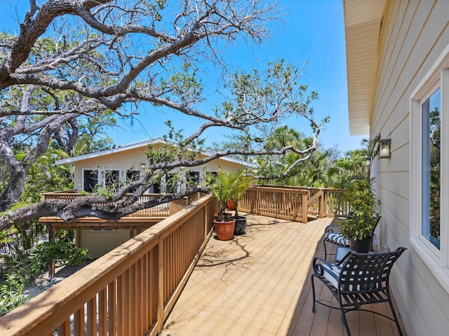 7320 Melaleuca Way, Siesta Key, FL 34242 - view of wooden terrace