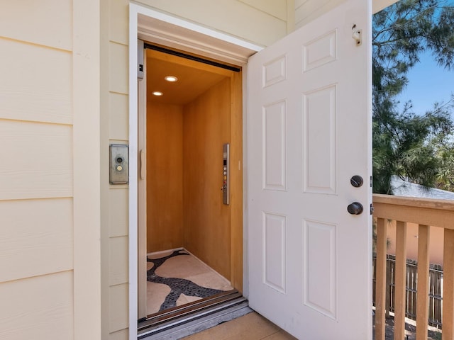 7320 Melaleuca Way, Siesta Key, FL 34242 - view of exterior entry featuring elevator