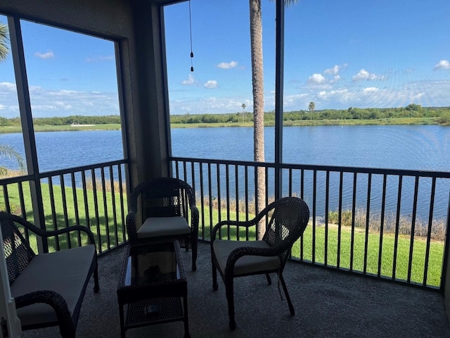 7911 Grand Estuary Trl Unit 201, Bradenton, FL 34212 - sunroom / solarium with a water view