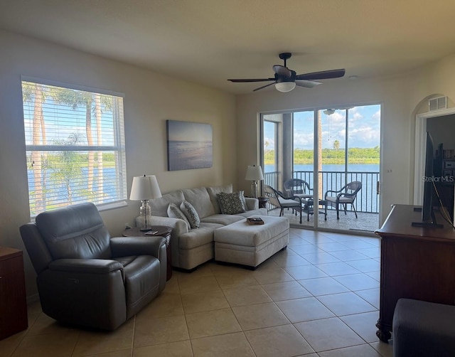 7911 Grand Estuary Trl Unit 201, Bradenton, FL 34212 - living room with ceiling fan and light tile patterned flooring